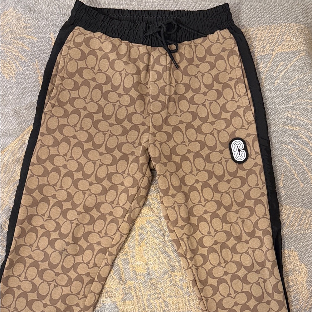 Coach monogrammed brown sweatpants